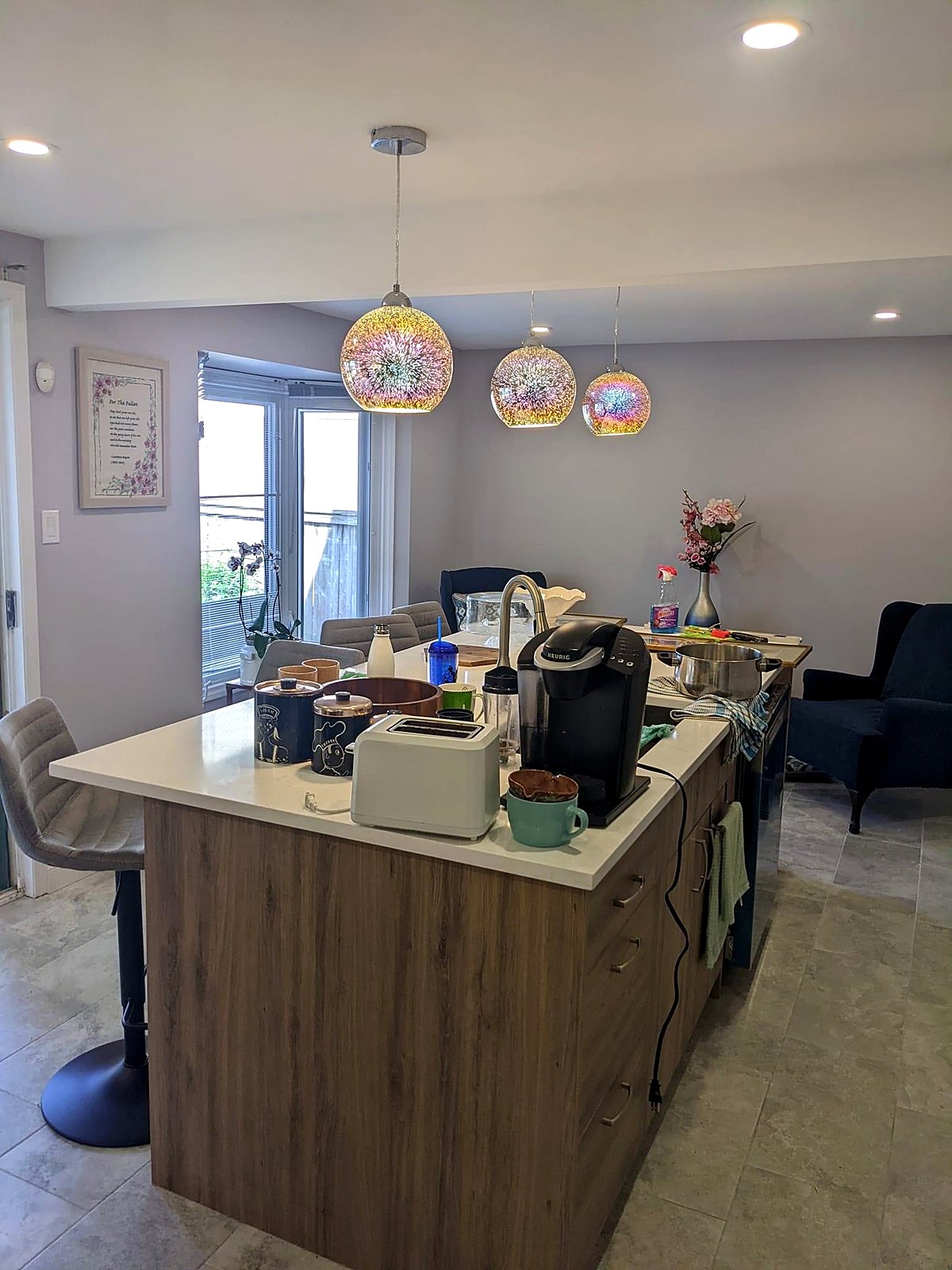 Island and seating in the finished kitchen